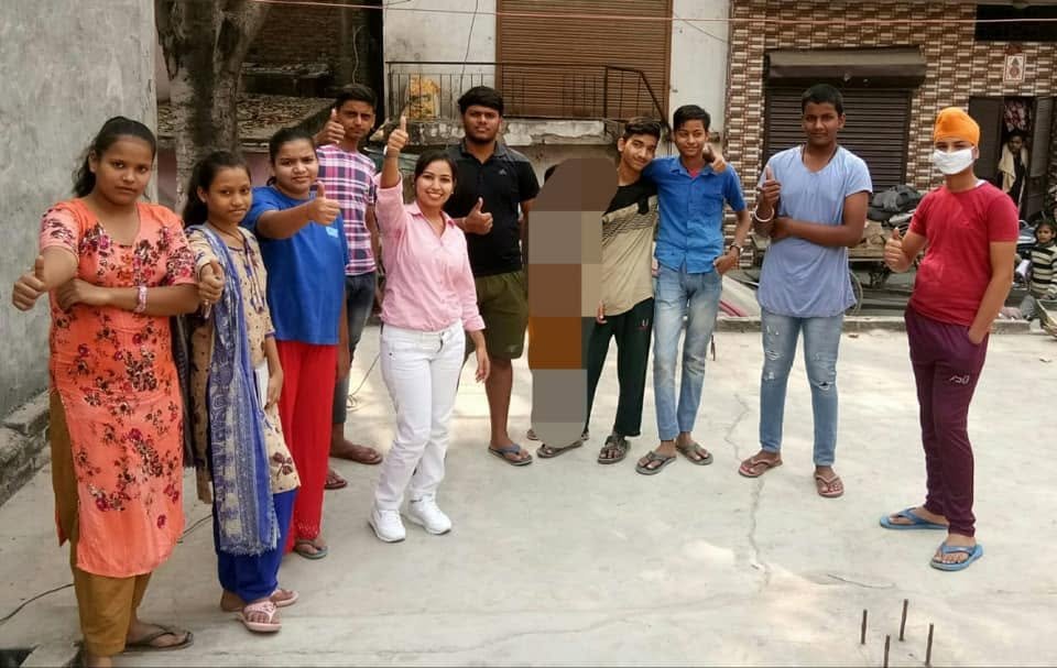Young people participating in a community activity